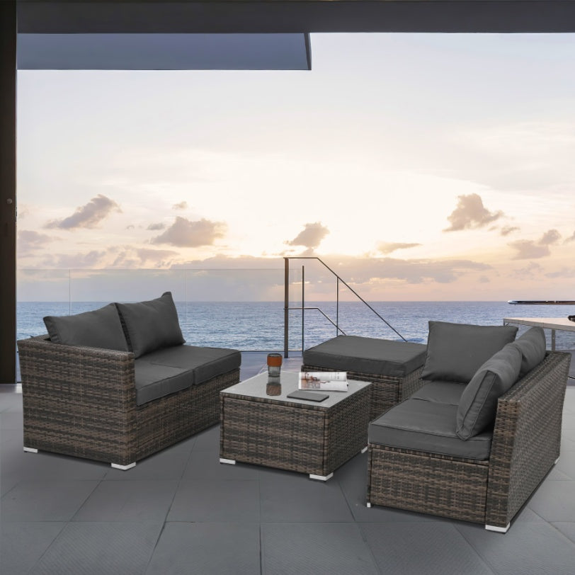4-Piece Outdoor PE Wicker Furniture Set – Corner Sofas, Ottoman & Tempered Glass Coffee Table