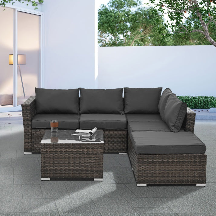 4-Piece Outdoor PE Wicker Furniture Set – Corner Sofas, Ottoman & Tempered Glass Coffee Table