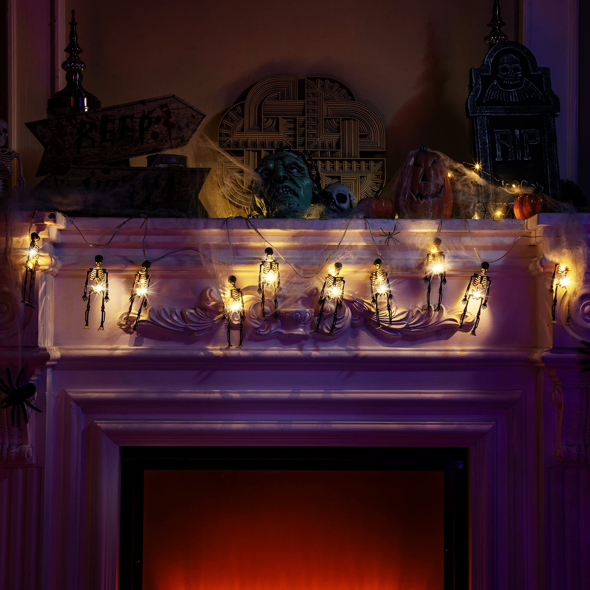 Halloween Skull String Lights – 2M Warm White LED, 20 Lights with 10 Skeletons, 8 Modes, Battery Powered Indoor/Outdoor Décor