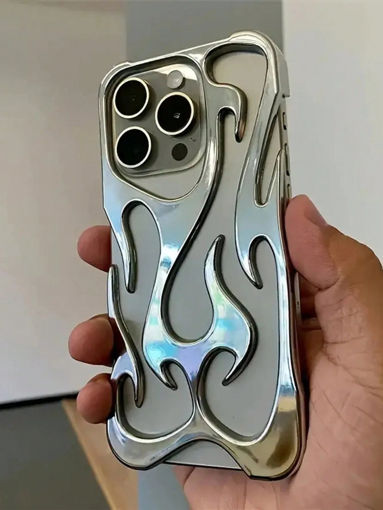 Hollowed Flame iPhone Case – Electroplated Silver Cool Design for iPhone 15–11 Pro Max & Plus