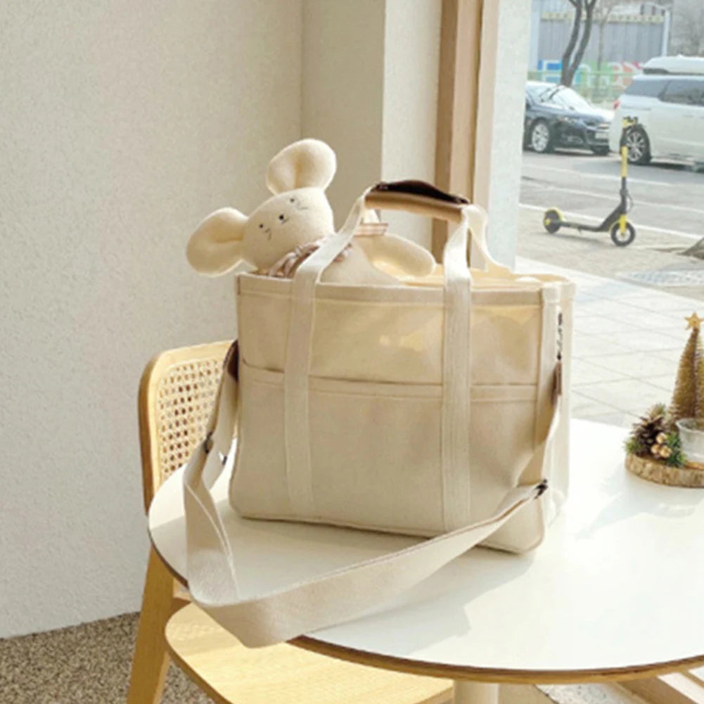 Women’s large-capacity canvas tote bag – multi-pocket casual shopping & travel handbag with adjustable shoulder strap
