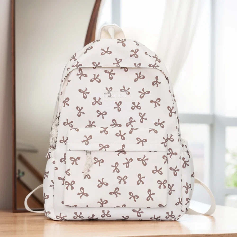 Bow Print Nylon Student Backpack for Girls & Women – Cute Schoolbag with Adjustable Straps for Travel & Daily Use