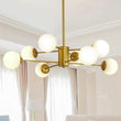 Modern 8-Light Gold Chandelier – Elegant Ceiling Light with White Glass Globe Shades (No Bulbs Included)