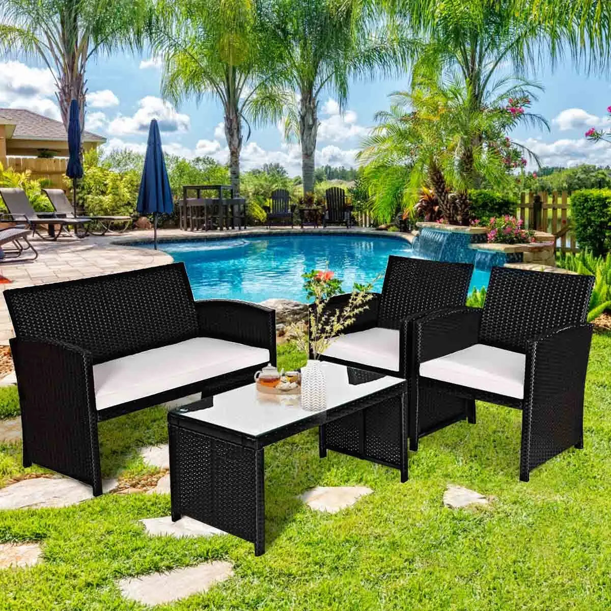 “4-Piece Rattan Patio Conversation Set – Cushioned Outdoor Sofa, 2 Chairs & Coffee Table with Tempered Glass Top”