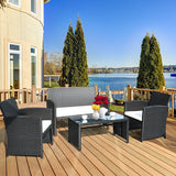 “4-Piece Rattan Patio Conversation Set – Cushioned Outdoor Sofa, 2 Chairs & Coffee Table with Tempered Glass Top”