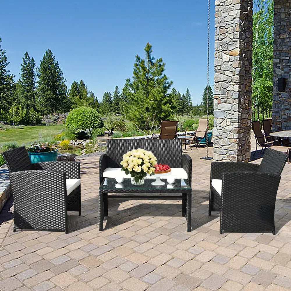 “4-Piece Rattan Patio Conversation Set – Cushioned Outdoor Sofa, 2 Chairs & Coffee Table with Tempered Glass Top”