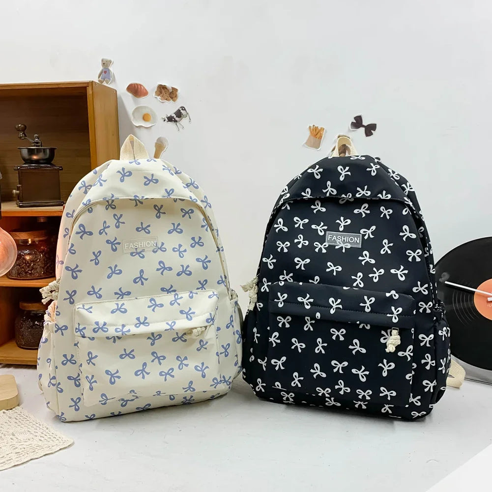 Bow Print Nylon Student Backpack for Girls & Women – Cute Schoolbag with Adjustable Straps for Travel & Daily Use